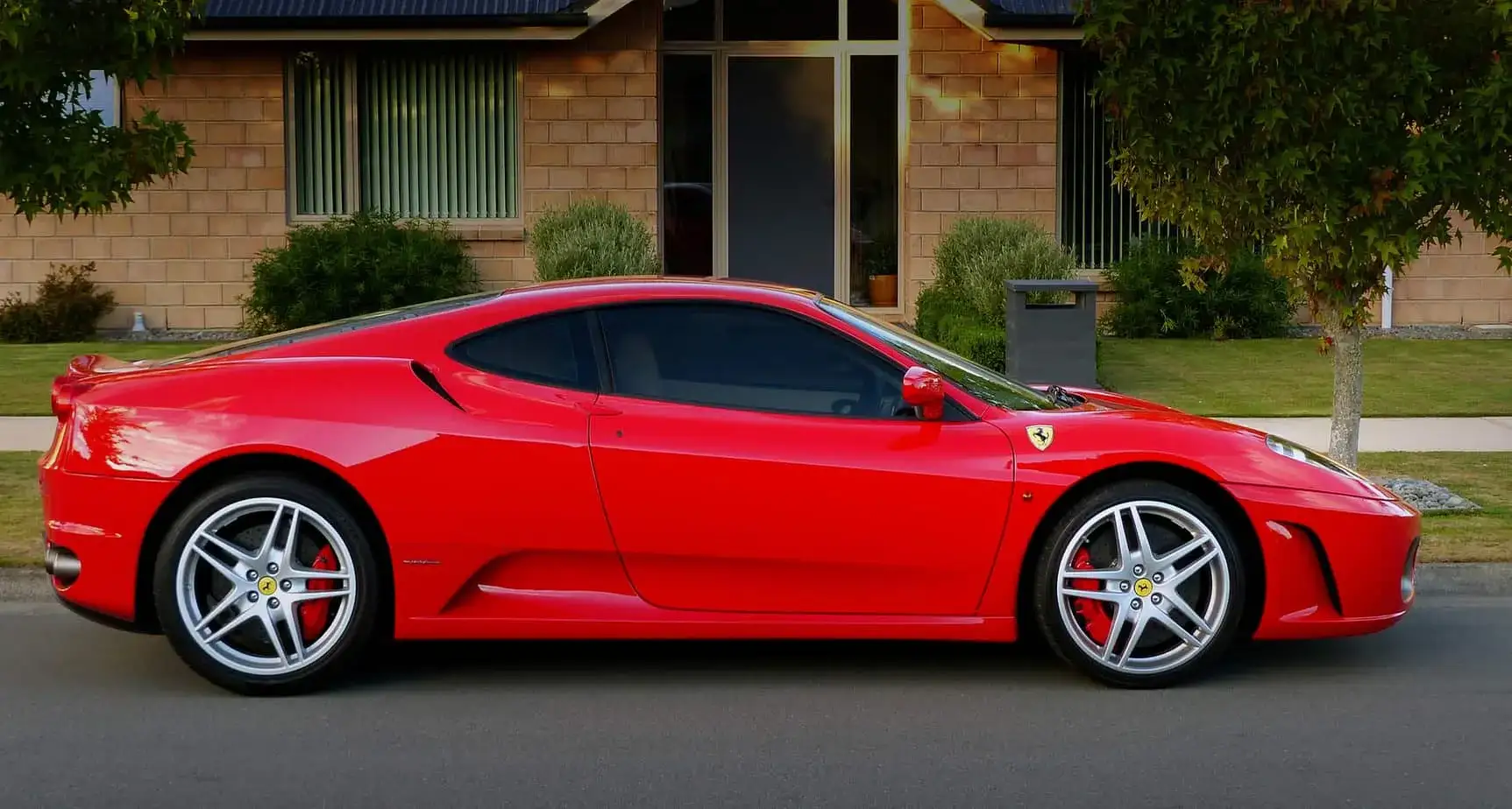 Victoria exotic car on flatbed soft-strap transport
